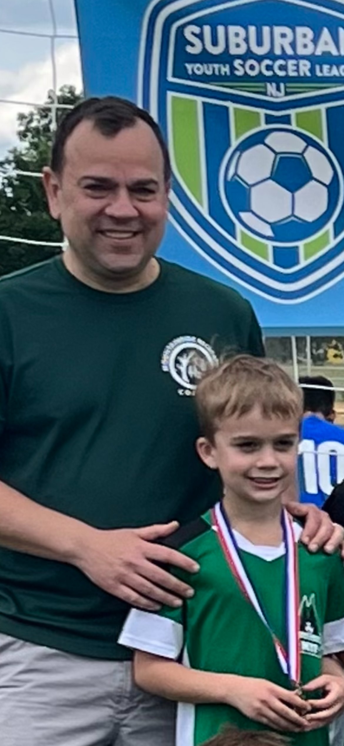 Rob and son at soccer